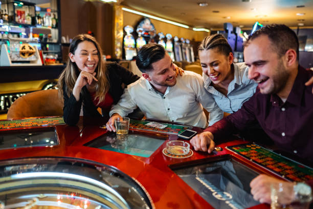 Live dealer at Hood vs Wolf table with multi-camera setup